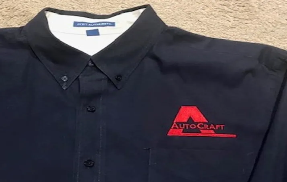Black shirt with a red AutoCraft logo on the chest.