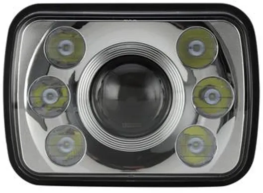 Close-up of a black LED headlight with multiple circular lights.