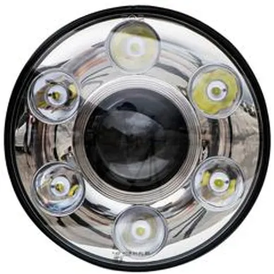 Close-up of a round LED headlight with multiple light sources.